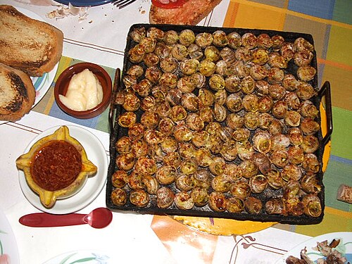Caracoles a la llauna, entrante